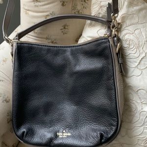 Two Toned Crossbody with expanding ability, two leather straps, zippered top